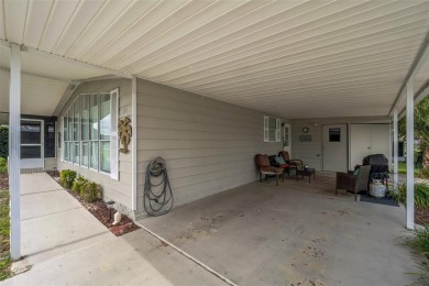 This 2-bedroom, 2-bathroom manufactured home in The Villages on Stonecrest Golf and Club Club in Florida - for sale on GolfHomes.com, golf home, golf lot