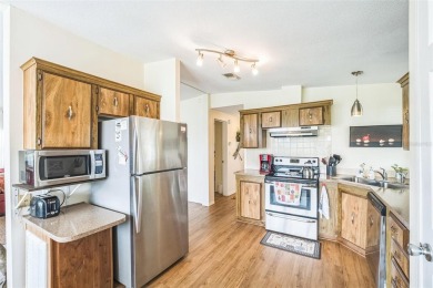 This 2-bedroom, 2-bathroom manufactured home in The Villages on Stonecrest Golf and Club Club in Florida - for sale on GolfHomes.com, golf home, golf lot