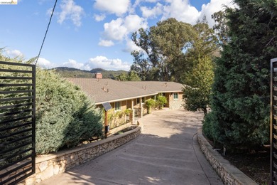 This one checks all of the boxes & more; sunny, expansive views on Lake Chabot Golf Course in California - for sale on GolfHomes.com, golf home, golf lot