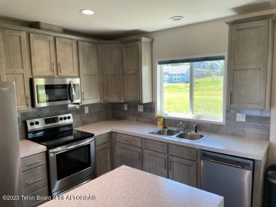 The perfect single level home in Afton, located between the golf on Valli Vu Golf Course in Wyoming - for sale on GolfHomes.com, golf home, golf lot