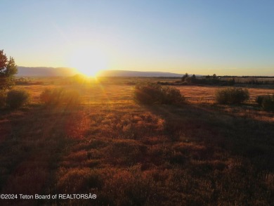 Spring Creek Farms is home to this beautiful 9.23 acre parcel on Targhee Village Golf Course in Wyoming - for sale on GolfHomes.com, golf home, golf lot