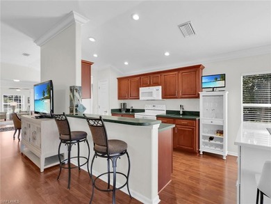 Enjoy resort-style living in this furnished 2 bedroom + den, 2 on Colonial Country Club in Florida - for sale on GolfHomes.com, golf home, golf lot