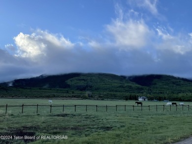 Spring Creek Farms is home to this beautiful 9.23 acre parcel on Targhee Village Golf Course in Wyoming - for sale on GolfHomes.com, golf home, golf lot