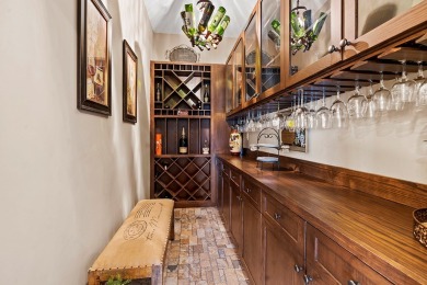 Welcome to 303 Commonwealth Dr., a stunning lakeside retreat in on The Patriot Golf Club At Grand Harbor in South Carolina - for sale on GolfHomes.com, golf home, golf lot