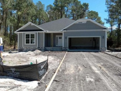 This beautiful 1902 SF - one-story home is under construction on Harbour Point Golf Club in North Carolina - for sale on GolfHomes.com, golf home, golf lot