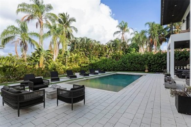 Featured on the hit Netflix series Designing Miami, this on Jacaranda Golf Club in Florida - for sale on GolfHomes.com, golf home, golf lot