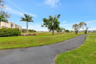 Experience elevated living in this exquisitely renovated on Marina Lakes Golf Course in Florida - for sale on GolfHomes.com, golf home, golf lot