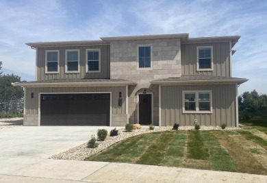 Brand new construction, fully landscaped. Located in Hidden on Hidden Bridge Golf Club in Wyoming - for sale on GolfHomes.com, golf home, golf lot