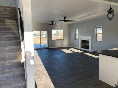 Brand new construction, fully landscaped. Located in Hidden on Hidden Bridge Golf Club in Wyoming - for sale on GolfHomes.com, golf home, golf lot