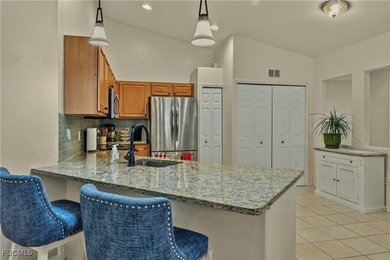 ATTRACTIVELY UPDATED UPSTAIRS END UNIT THAT OFFERS TERRIFIC OPEN on Colonial Country Club in Florida - for sale on GolfHomes.com, golf home, golf lot