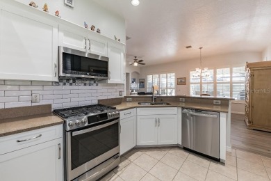Welcome to a beautifully maintained 3-bedroom, 2-bathroom home on Venetian Golf and River Club in Florida - for sale on GolfHomes.com, golf home, golf lot