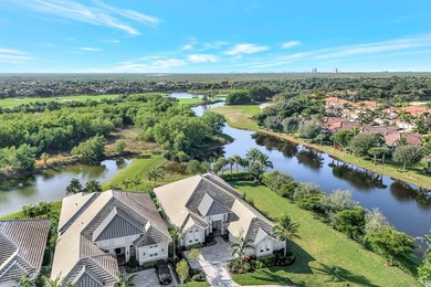 This stunning single-story residence, built in 2023, showcases on The Golf Club At Fiddlers Creek in Florida - for sale on GolfHomes.com, golf home, golf lot