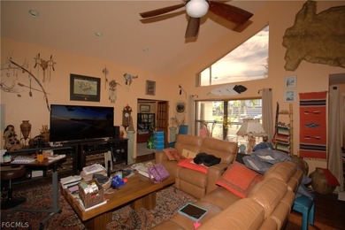 High Ceiling Greatroom with a POOL directly on PALMETTO PINES on Palmetto-Pine Country Club in Florida - for sale on GolfHomes.com, golf home, golf lot