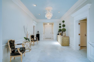 **STUNNING ARCHITECTURAL ESTATE in the coveted OAKS BAYSIDE on The Oaks Club in Florida - for sale on GolfHomes.com, golf home, golf lot