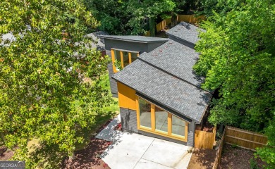 Stunning Mid-Century Modern Gem in Adams Park! Welcome to this on Alfred Tup Holmes Golf Course in Georgia - for sale on GolfHomes.com, golf home, golf lot