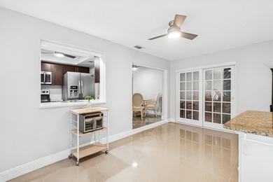 Welcome to this charming and worry-free 2-bedroom, 1-bath on Leisureville Community Golf Course in Florida - for sale on GolfHomes.com, golf home, golf lot