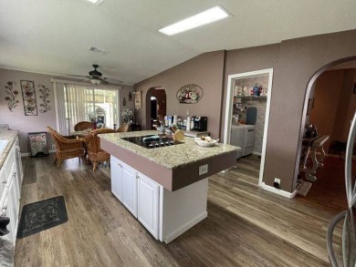 This three-bed, two-bath beauty is spacious and clean with on Four Lakes Golf Club in Florida - for sale on GolfHomes.com, golf home, golf lot