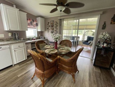 This three-bed, two-bath beauty is spacious and clean with on Four Lakes Golf Club in Florida - for sale on GolfHomes.com, golf home, golf lot