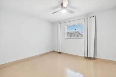 Welcome to this charming and worry-free 2-bedroom, 1-bath on Leisureville Community Golf Course in Florida - for sale on GolfHomes.com, golf home, golf lot