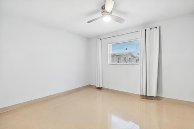 Welcome to this charming and worry-free 2-bedroom, 1-bath on Leisureville Community Golf Course in Florida - for sale on GolfHomes.com, golf home, golf lot