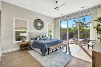 This stunning single-story residence, built in 2023, showcases on The Golf Club At Fiddlers Creek in Florida - for sale on GolfHomes.com, golf home, golf lot