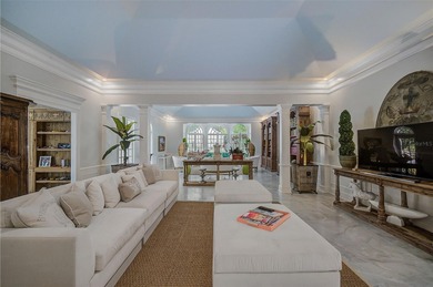 **STUNNING ARCHITECTURAL ESTATE in the coveted OAKS BAYSIDE on The Oaks Club in Florida - for sale on GolfHomes.com, golf home, golf lot