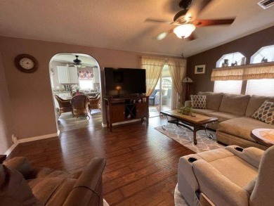 This three-bed, two-bath beauty is spacious and clean with on Four Lakes Golf Club in Florida - for sale on GolfHomes.com, golf home, golf lot