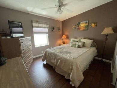 This three-bed, two-bath beauty is spacious and clean with on Four Lakes Golf Club in Florida - for sale on GolfHomes.com, golf home, golf lot