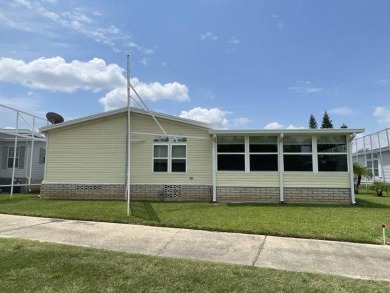 This three-bed, two-bath beauty is spacious and clean with on Four Lakes Golf Club in Florida - for sale on GolfHomes.com, golf home, golf lot