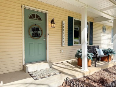 Nestled along the shoreline in a serene lake community, this on Terre Du Lac Golf and Country Club in Missouri - for sale on GolfHomes.com, golf home, golf lot