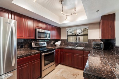 Discover comfort and style in this upgraded 2-bed, 1-bath corner on Arizona Biltmore Golf and Country Club in Arizona - for sale on GolfHomes.com, golf home, golf lot