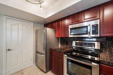 Discover comfort and style in this upgraded 2-bed, 1-bath corner on Arizona Biltmore Golf and Country Club in Arizona - for sale on GolfHomes.com, golf home, golf lot