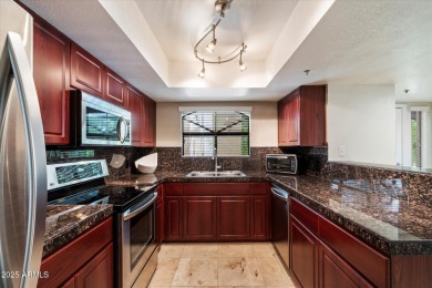 Discover comfort and style in this upgraded 2-bed, 1-bath corner on Arizona Biltmore Golf and Country Club in Arizona - for sale on GolfHomes.com, golf home, golf lot