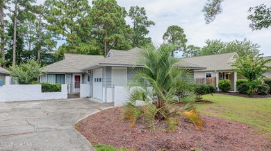 Nestled in one of Hampstead's most desirable neighborhoods, this on Belvedere Country Club in North Carolina - for sale on GolfHomes.com, golf home, golf lot
