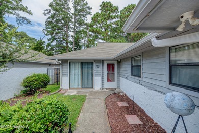 Nestled in one of Hampstead's most desirable neighborhoods, this on Belvedere Country Club in North Carolina - for sale on GolfHomes.com, golf home, golf lot