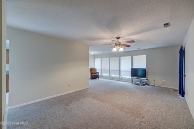 Nestled in one of Hampstead's most desirable neighborhoods, this on Belvedere Country Club in North Carolina - for sale on GolfHomes.com, golf home, golf lot