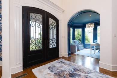 Situated on a beautifully landscaped lot in the coveted gated on Chenal Country Club - Bear Den Mountain in Arkansas - for sale on GolfHomes.com, golf home, golf lot