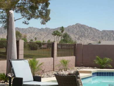 LOVELY HOME ON THE 11TH FAIRWAY OF MESA DEL SOL. BEAUTIFUL on Mesa Del Sol Golf Club in Arizona - for sale on GolfHomes.com, golf home, golf lot