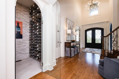 Situated on a beautifully landscaped lot in the coveted gated on Chenal Country Club - Bear Den Mountain in Arkansas - for sale on GolfHomes.com, golf home, golf lot