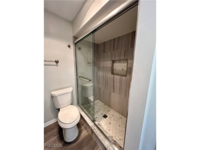 Step into this beautifully updated condo where every detail has on Myerlee Country Club in Florida - for sale on GolfHomes.com, golf home, golf lot