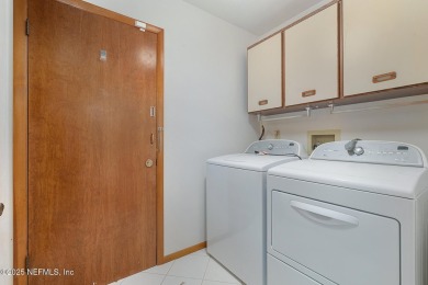 Golf Course Living at its Finest: Coveted Corner Unit in Pine on The Grand Club - Pine Lakes Course in Florida - for sale on GolfHomes.com, golf home, golf lot