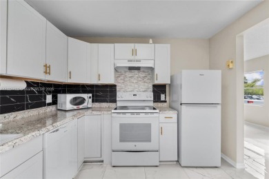 FOR SALE - 2/2 CORNER UNIT - LOW FLOOR - UPDATED KITCHEN (JUNE on Flamingo Lakes Country Club in Florida - for sale on GolfHomes.com, golf home, golf lot