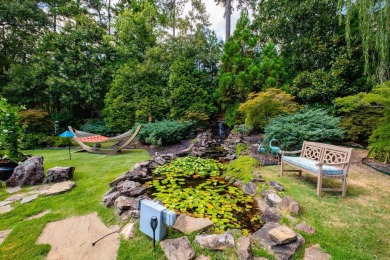 Situated on a beautifully landscaped lot in the coveted gated on Chenal Country Club - Bear Den Mountain in Arkansas - for sale on GolfHomes.com, golf home, golf lot