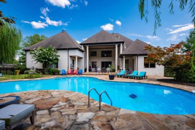 Situated on a beautifully landscaped lot in the coveted gated on Chenal Country Club - Bear Den Mountain in Arkansas - for sale on GolfHomes.com, golf home, golf lot