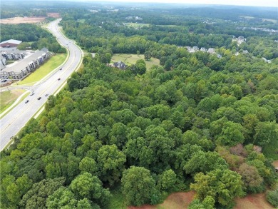 POTENTIAL COMMERCIAL! 17.675+/- acres now available in rapidly on Reunion Golf Club in Georgia - for sale on GolfHomes.com, golf home, golf lot