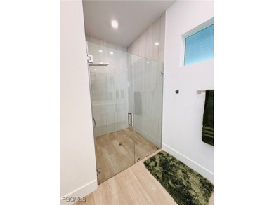 Experience elevated coastal luxury in this impeccably designed on Burnt Store Golf Club in Florida - for sale on GolfHomes.com, golf home, golf lot