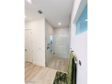 Experience elevated coastal luxury in this impeccably designed on Burnt Store Golf Club in Florida - for sale on GolfHomes.com, golf home, golf lot