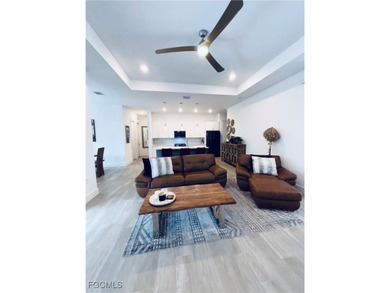 Experience elevated coastal luxury in this impeccably designed on Burnt Store Golf Club in Florida - for sale on GolfHomes.com, golf home, golf lot