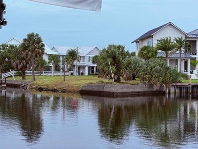 Imagine owning a rare canal front corner lot in picturesque on  in Florida - for sale on GolfHomes.com, golf home, golf lot