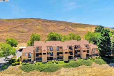 Discover serene living in this top-floor unit, offering stunning on Canyon Lakes Country Club in California - for sale on GolfHomes.com, golf home, golf lot